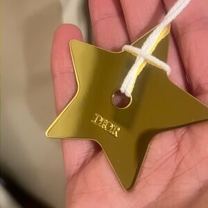 Dior Gold Star Ornament and Dior bag
